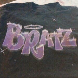 A crop trop Bratz shirt and a Dress